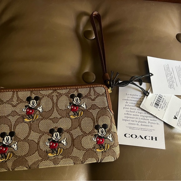 Coach Handbags - NWT Coach Mickey wristlet.